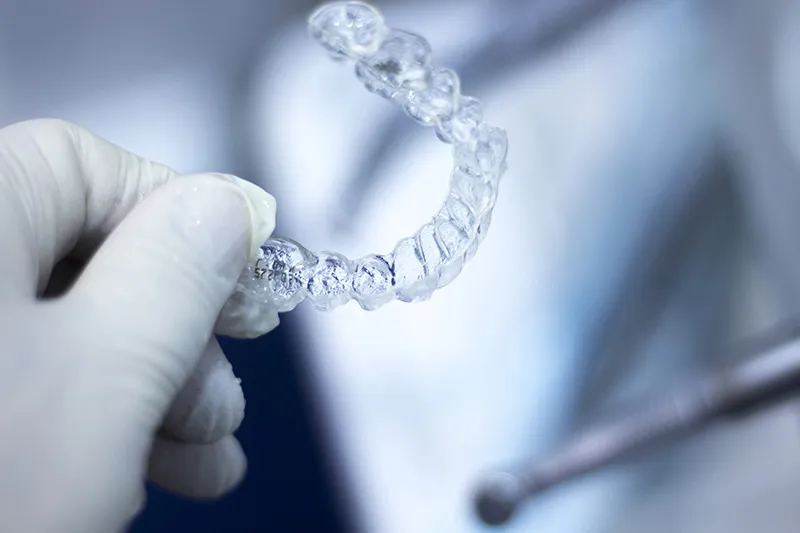 Invisalign clear aligners for teeth straightening in Sundance Calgary